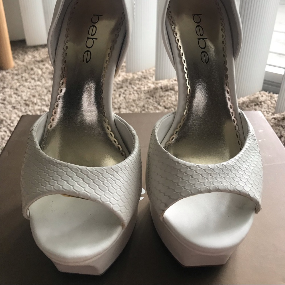 Bebe white pumps heels